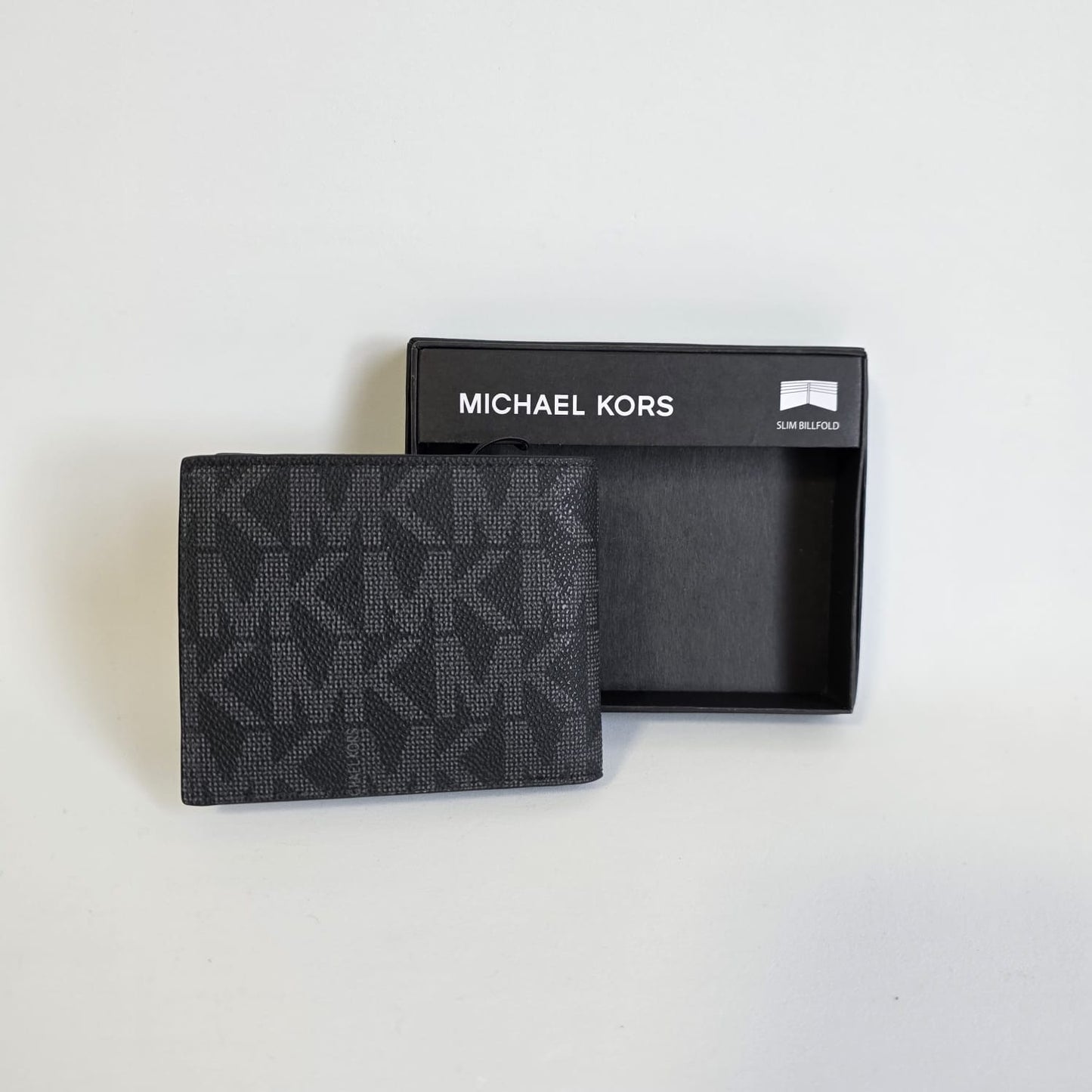 Cartera Slim Billfold MK Monogram