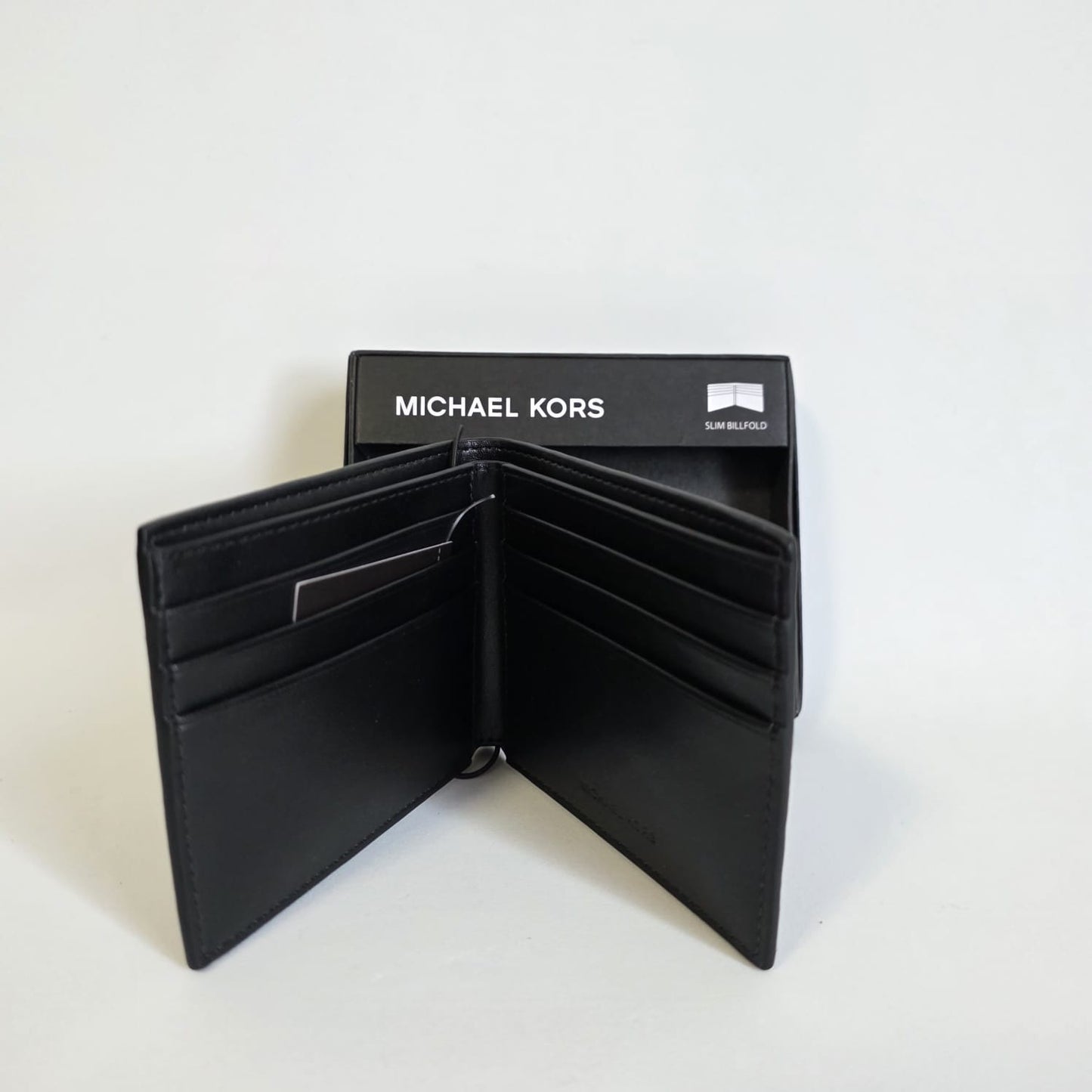 Cartera Slim Billfold MK Monogram